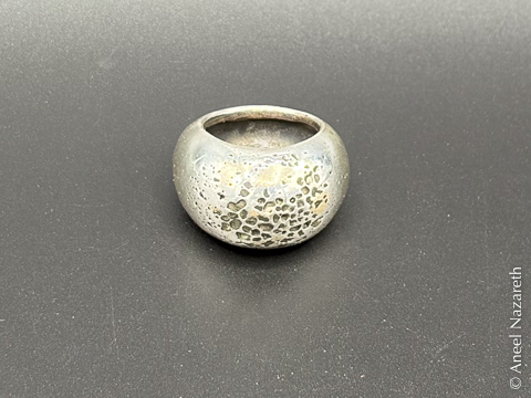 Another view of the ring without the glass